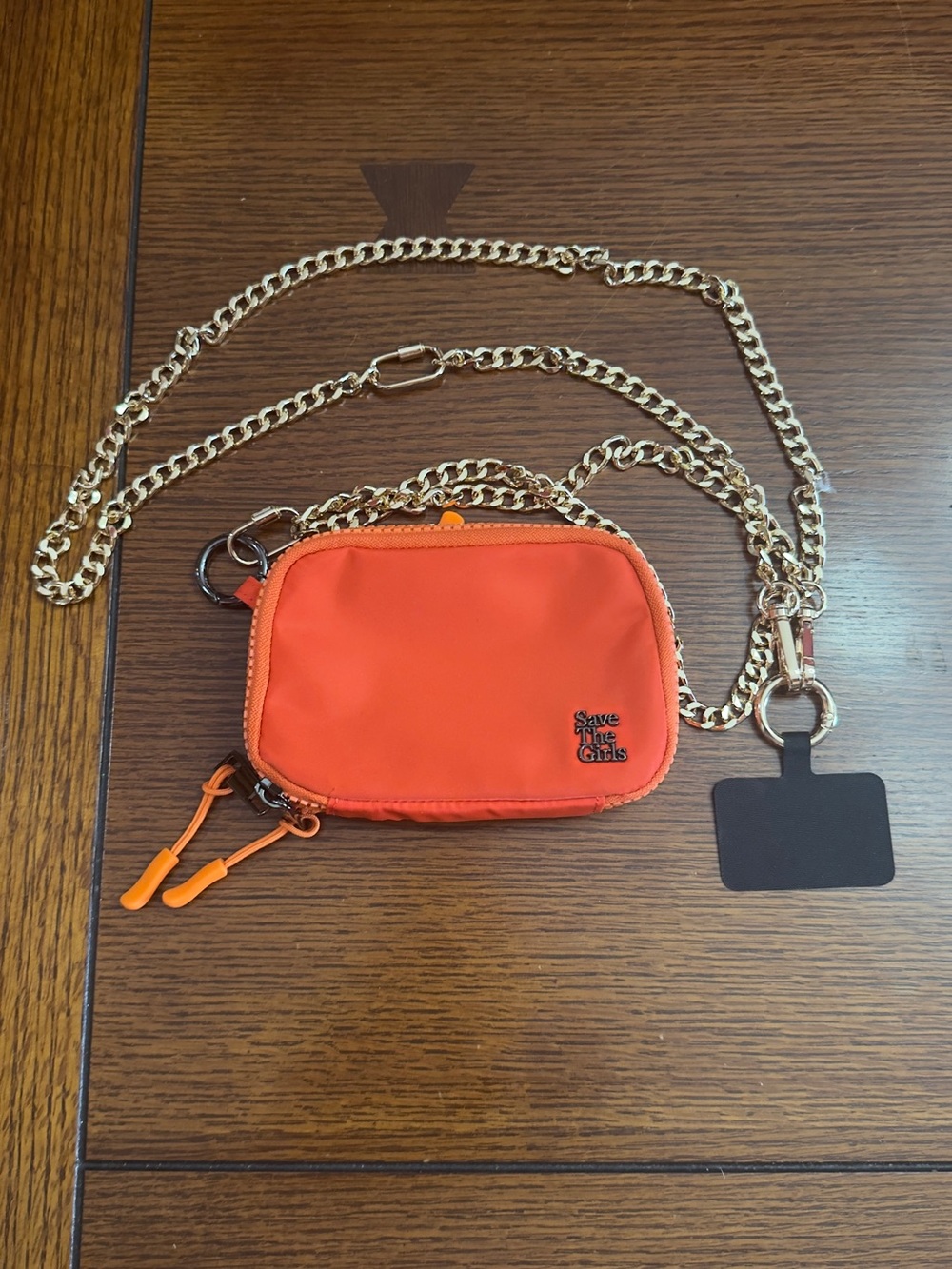 Save The Girls Orange Crossbody Pouch with Gold Chain